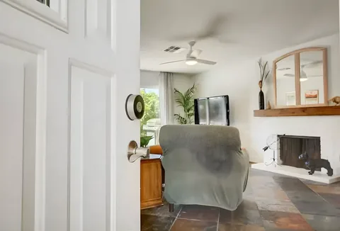 Entry and sitting area with fireplace at a rental property we manage in Las Vegas, Nevada
