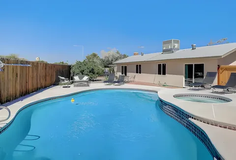 Backyard swimming pool and covered patio at a rental property we manage in Las Vegas, Nevada